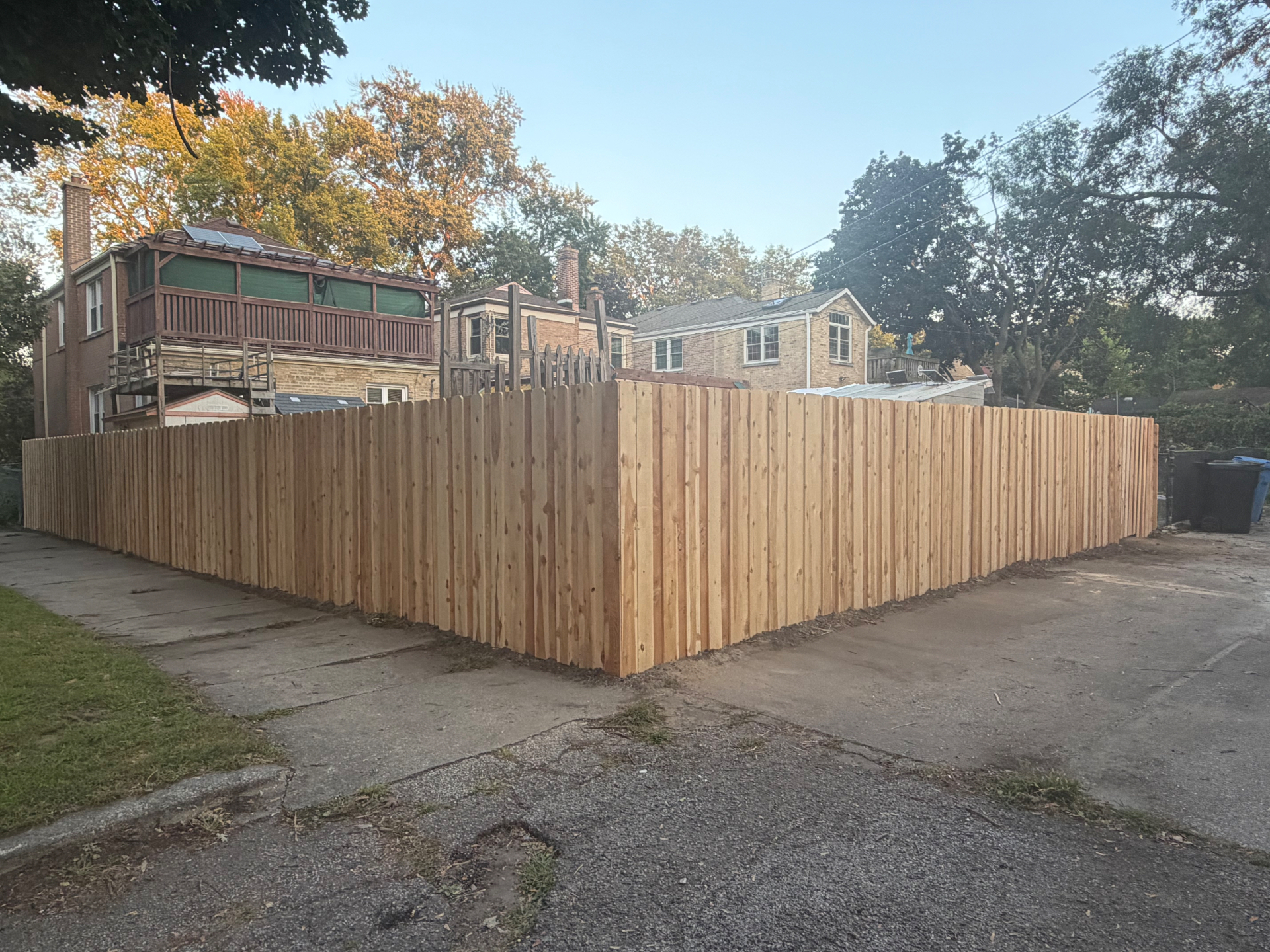 New cedar privacy fence enclosing a Chicago backyard