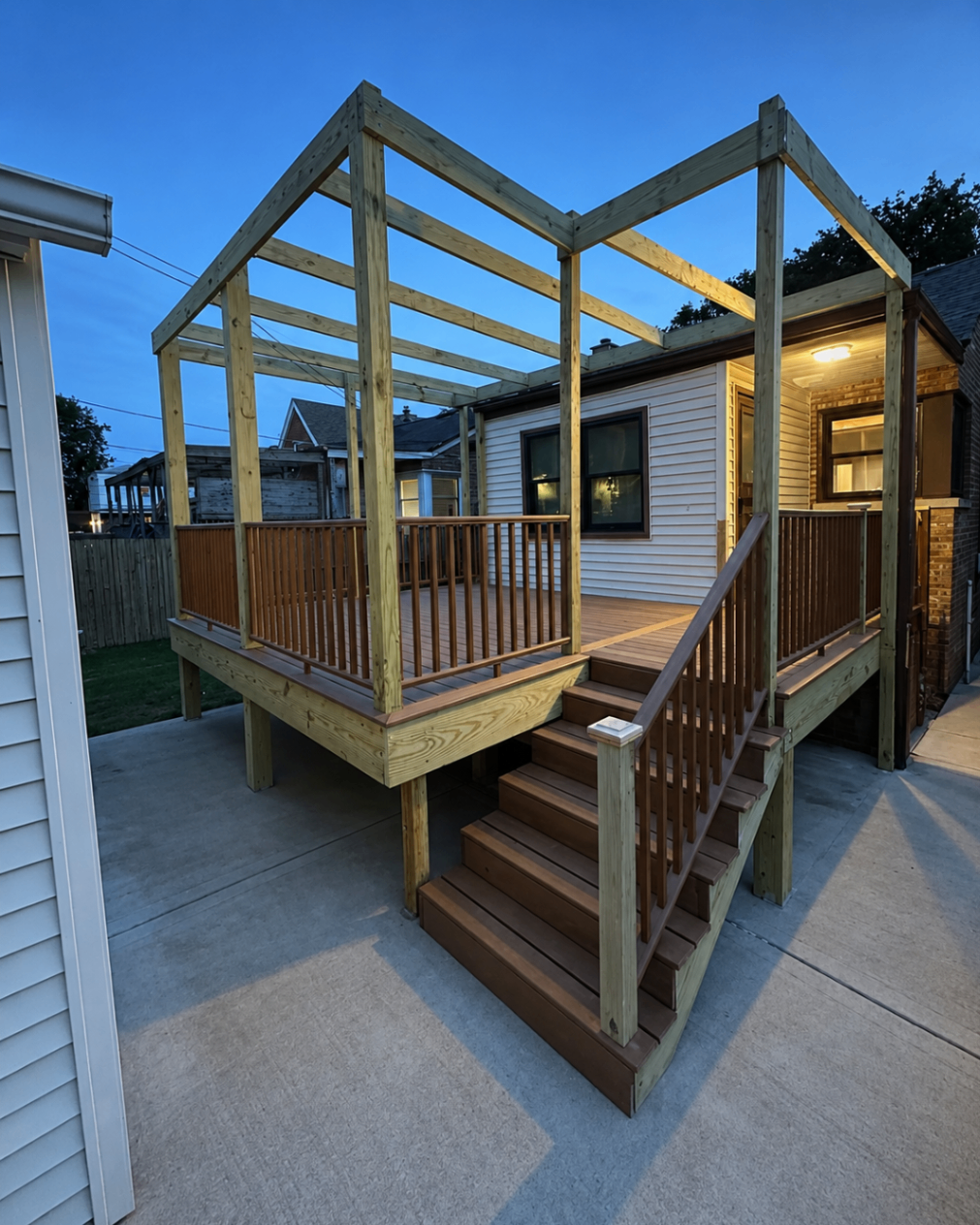 Pergola deck structure photographed at dusk