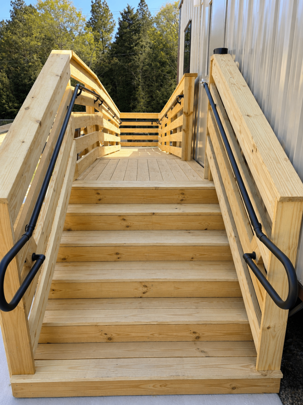 Custom accessibility ramp and rail system in natural wood